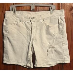 Levi’s women’s white high rise Bermuda shorts distressed size 31